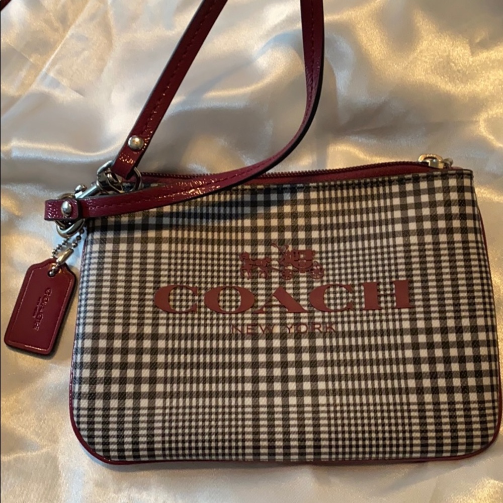 Coach patent checked wristlet. New without tags.